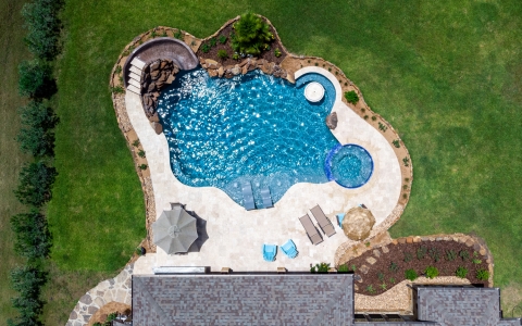 Freeform backyard swimming pool - Miller Pools