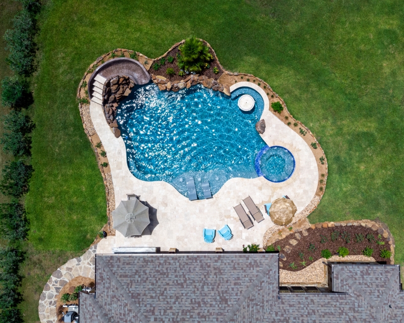 Freeform backyard swimming pool - Miller Pools