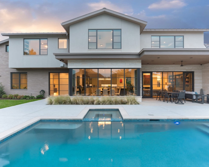 Outdoor swimming pool in back yard - Miller Pools