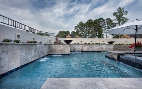 pool side view of pool fountains